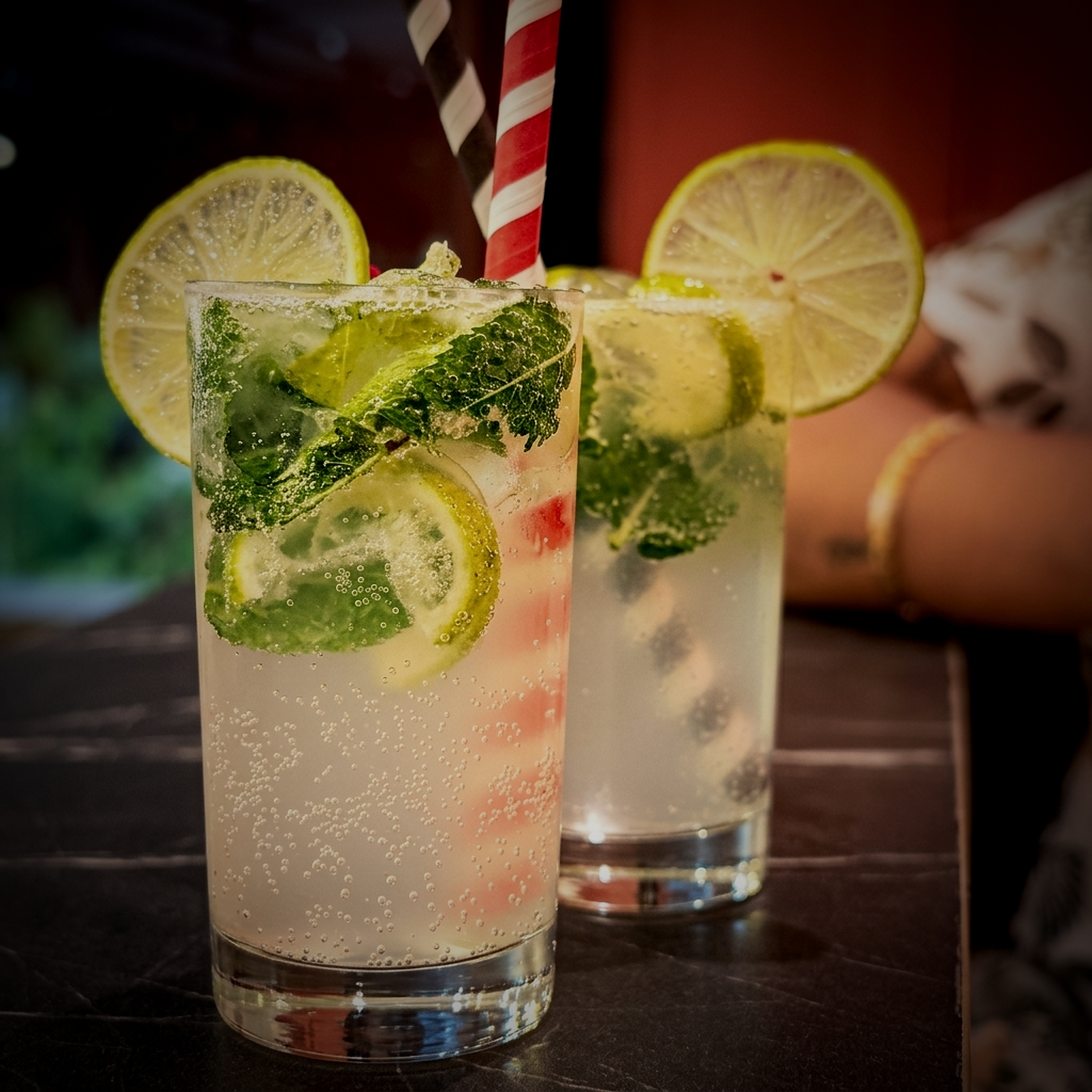 Refreshing lemonade mocktails with lime slices